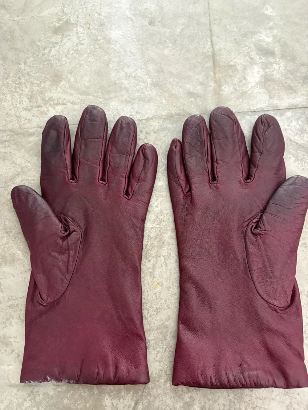 vintage-style burgundy leather gloves